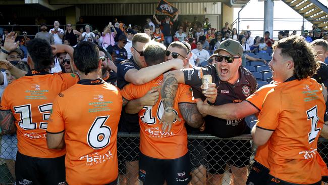 The Oaks Tigers celebrate with fans. Picture: John Appleyard