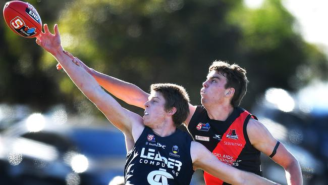 Cam McGree (left) competes against Riley Thilthorpe in the SANFL. Picture: Mark Brake