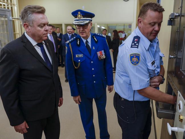 Anthony Roberts, left, and Corrective Services Commissioner Peter Severin tour a new Supermax 2 facility for terrorist inmates at Goulburn with Operations Manager Shaun Danby. Picture: Sean Davey