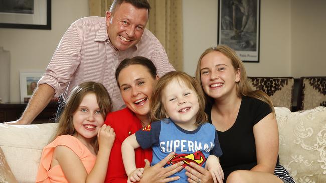 Jane Garrett at home with husband James Higgins and children Sasha 9, Max, 4 and Molly, 13. Picture: David Caird