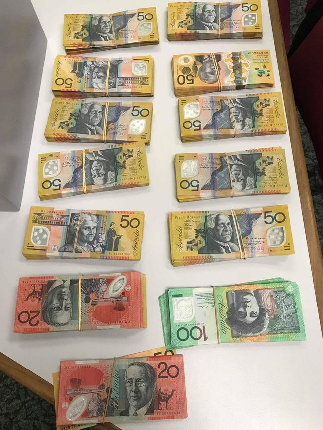 Officers found more than $62k in a safe in Quaid-Thomson’s garage.