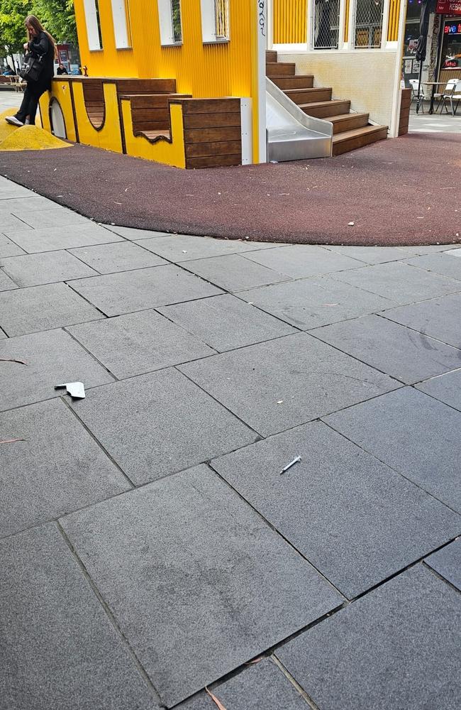 A used and uncapped syringe disposed metres away from children’s play equipment at Nicholson St Mall. Picture: supplied.