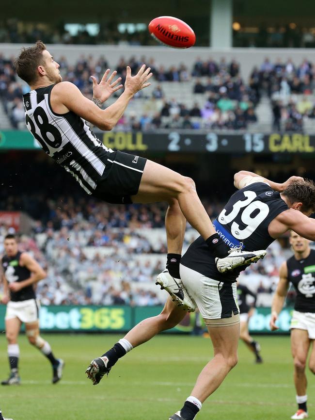 Exhibit A ... Pies fans enjoyed seeing Jeremy Howe fly over Dale Thomas. Picture: George Salpigtidis