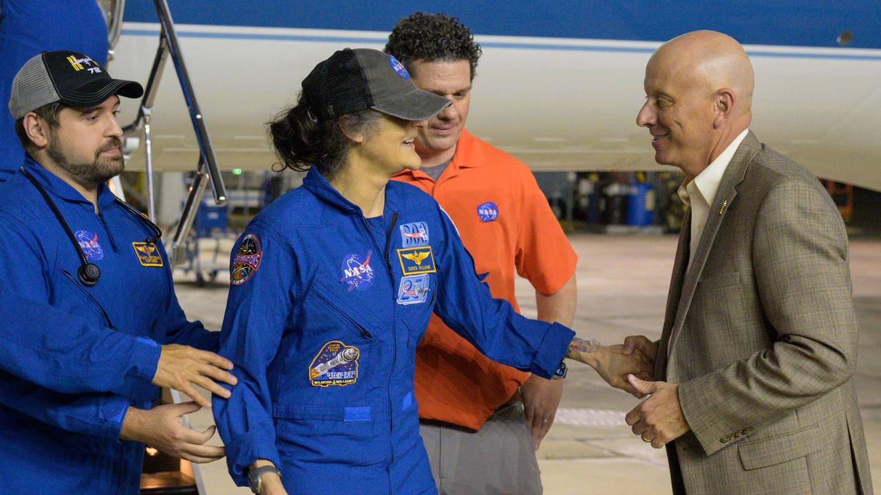 Crew-9 (NASA astronauts Butch Wilmore, Sunita Williams, Nick Hague and Roscosmos cosmonaut Aleksandr Gorbunov) crew return at Ellington Field, Houston, Texas. Photo Date: March 19, 2025. Location: Ellington Field – Guppy Hangar. Photo Credit: NASA/Robert Markowitz