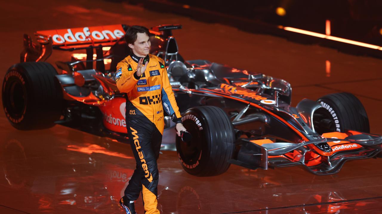 Oscar Piastri waves to the crowd during F1 75 Live. Photo by Clive Rose, Getty.