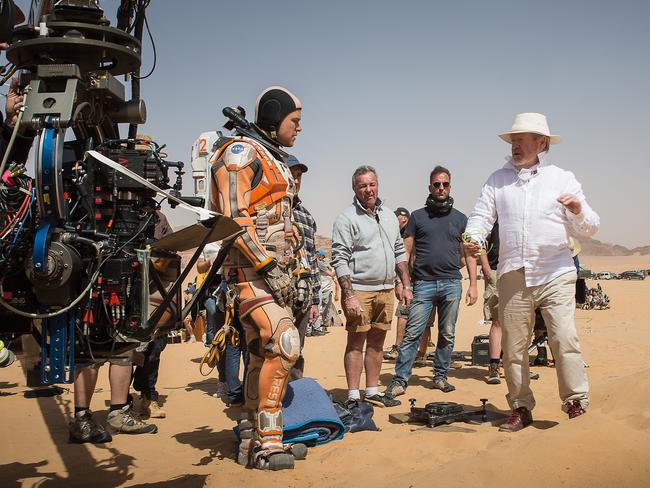 On location in Jordan, director Ridley Scott reviews a scene with Matt Damon, for THE MARTIAN. Published Credit: Aidan Monaghan