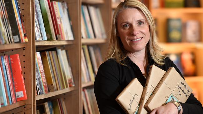 Robinsons Bookshop owner Susanne Horman with their 'Blind Date with a Book' books. One of the successful things the shop does is pick new releases, wrap them up and describe the book in three words so the customer is buying it 'blind'. Picture: Jason Sammon.