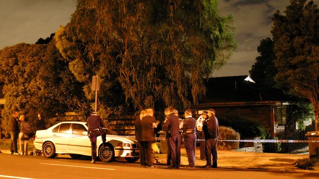 Police at the scene of a double murder in East Kew. 