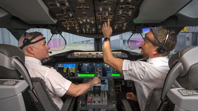 Qantas pilots operating Project Sunrise test flights donned head gear to monitor their brain activity during the long trip. Picture: Qantas