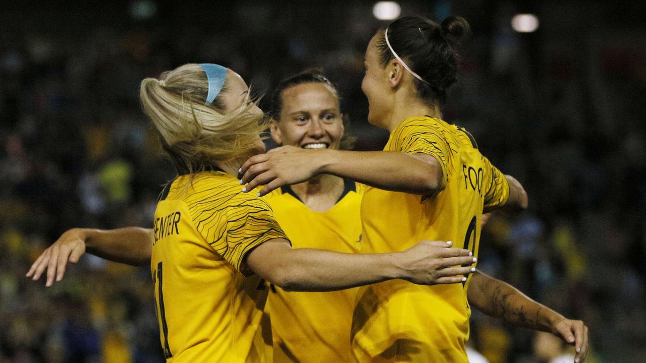 Caitlin Foord celebrates with team mates as the Socceroos ran riot in the second half.