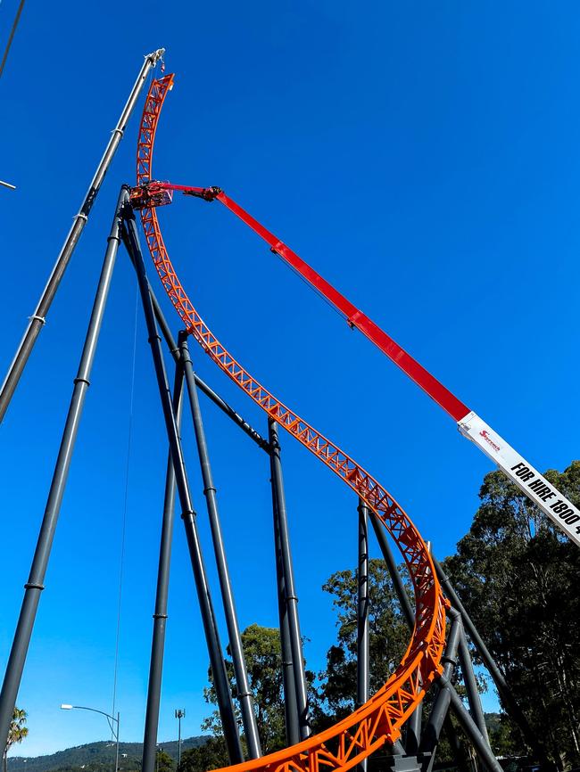 The final piece of Dreamworld's newest rollercoaster the Steel Taipan is in place. Picture: Supplied.