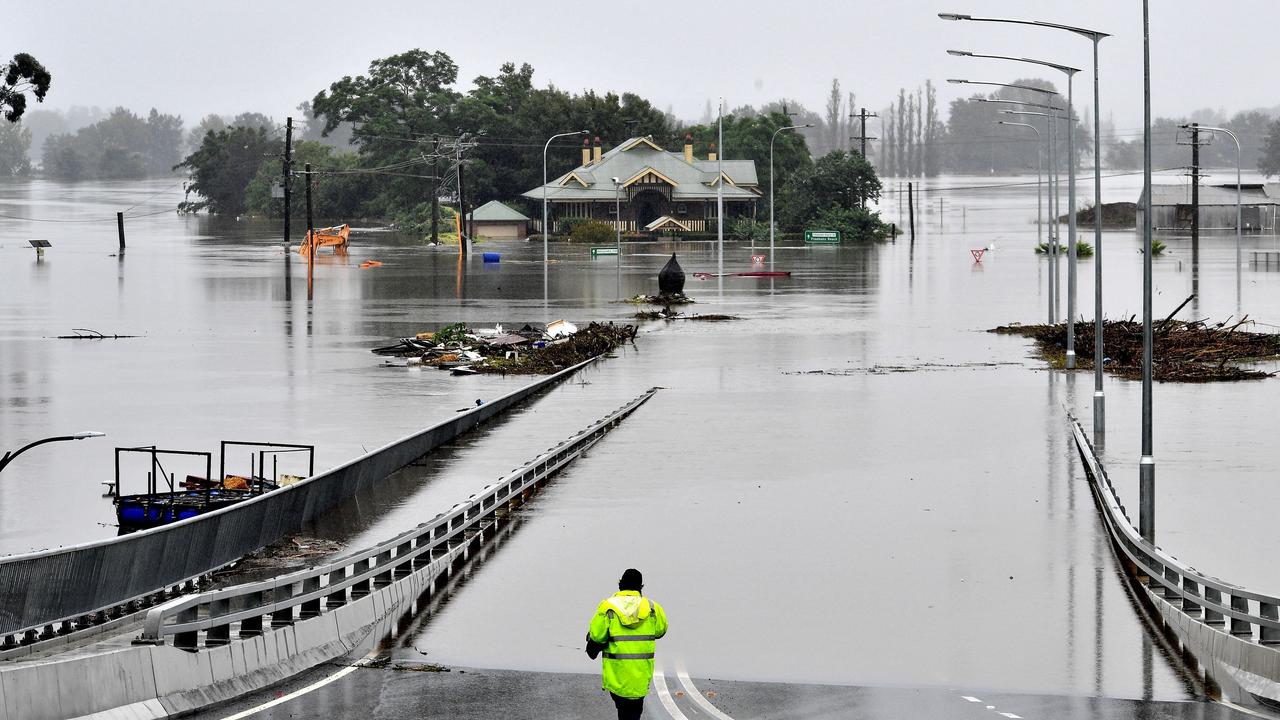 Floods, similar in size to those that washed over Sydney’s Windsor Bridge in March could occur again in the coming months. Picture: Saeed Khan/AFP