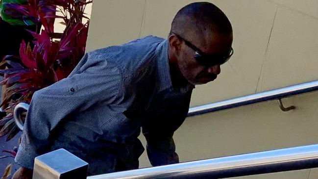 Desmond Ray Burns runs into the Mackay courthouse on September 30 for his sentence. Picture: Duncan Evans