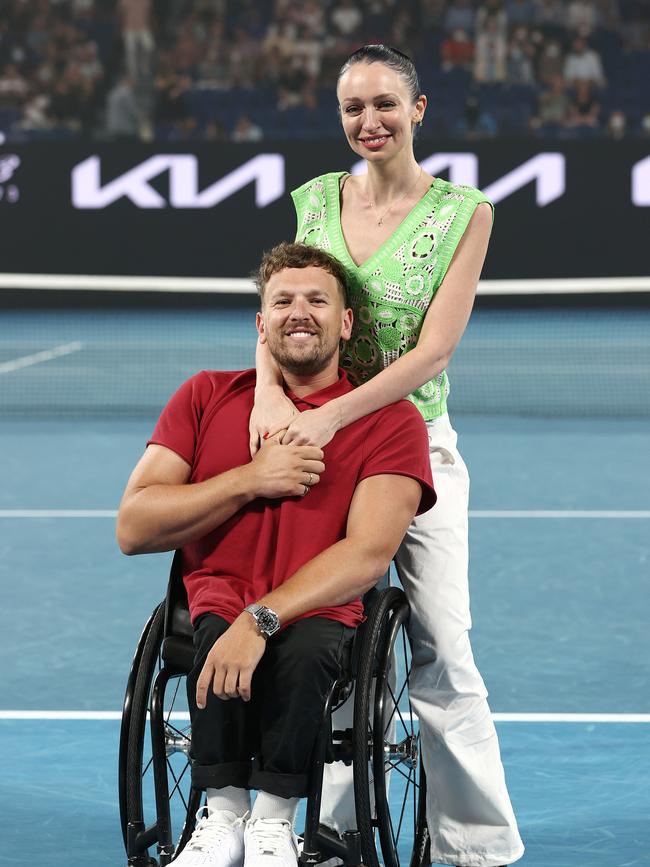 Dylan Alcott honoured on Rod Laver Arena with girlfriend Chantelle Otten. Photo: Michael Klein