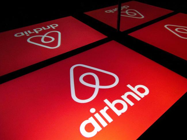 (FILES) This file illustration photo taken on November 22, 2019, shows the logo of the online lodging service Airbnb displayed on a tablet in Paris. - Home rental service Airbnb is shutting down its business in China as a pandemic lockdown shows no sign of ending there, a source close to the company told AFP on May 23, 2022. (Photo by Lionel BONAVENTURE / AFP)