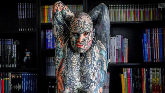 Primary school teacher and tattoo enthusiast in France, Sylvain Helaine, wears his ink with pride. Picture: AFP