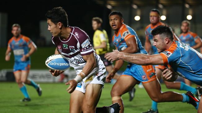 Troy Leo gets through the Pride's defensive line. Picture: Brendan Radke