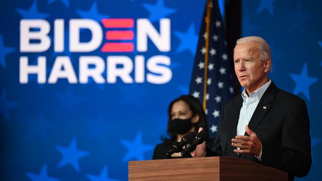 Democratic Presidential candidate Joe Biden speaks as US Senator and Vice-Presidential candidate, Kamala Harris, looks on at the Queen venue in Wilmington, Delaware overnight. Picture: AFP