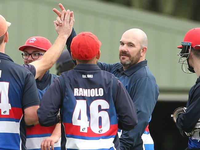 Premier Cricket Second XI GF: Footscray v Melbourne: Dale McDonald of Footscray celebrates with team mates after taking the wicket of Xander Buxton of Melbourne batting on Saturday, April 17, 2021 in Footscray, Australia