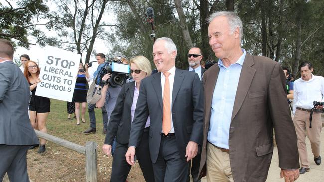 Protestors disrupt a press call with Prime Minister Malcolm Turnbull and Liberal Candidate for Bennelong John Alexander at Putney. Picture: Tim Hunter