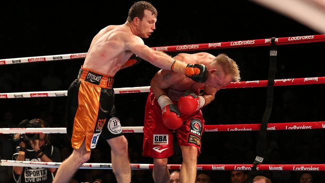Jeff Horn lands the punch that sent Rico Mueller through the ropes.