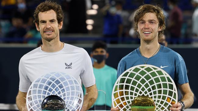 Andrey Rublev (right), who won the Mubadala World Tennis Championship final over Andy Murray, has tested positive for Covid-19. Picture: AFP