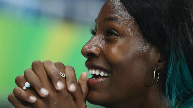 Winners are grinners, even if they fall over. Photo: Alexander Hassenstein/Getty Images