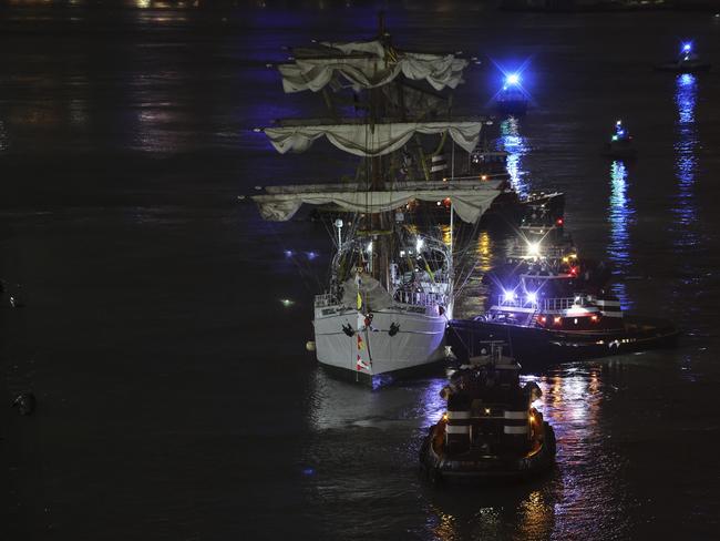 Tug boats assist the ship after the accident. AP Photo/Yuki Iwamura