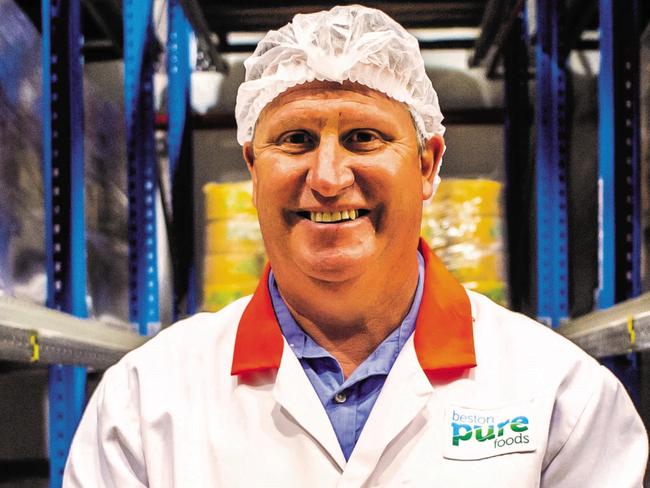 Beston Global Food Company's master cheesemaker Paul Connolly with a wheel of romano cheese. Pic: Beston