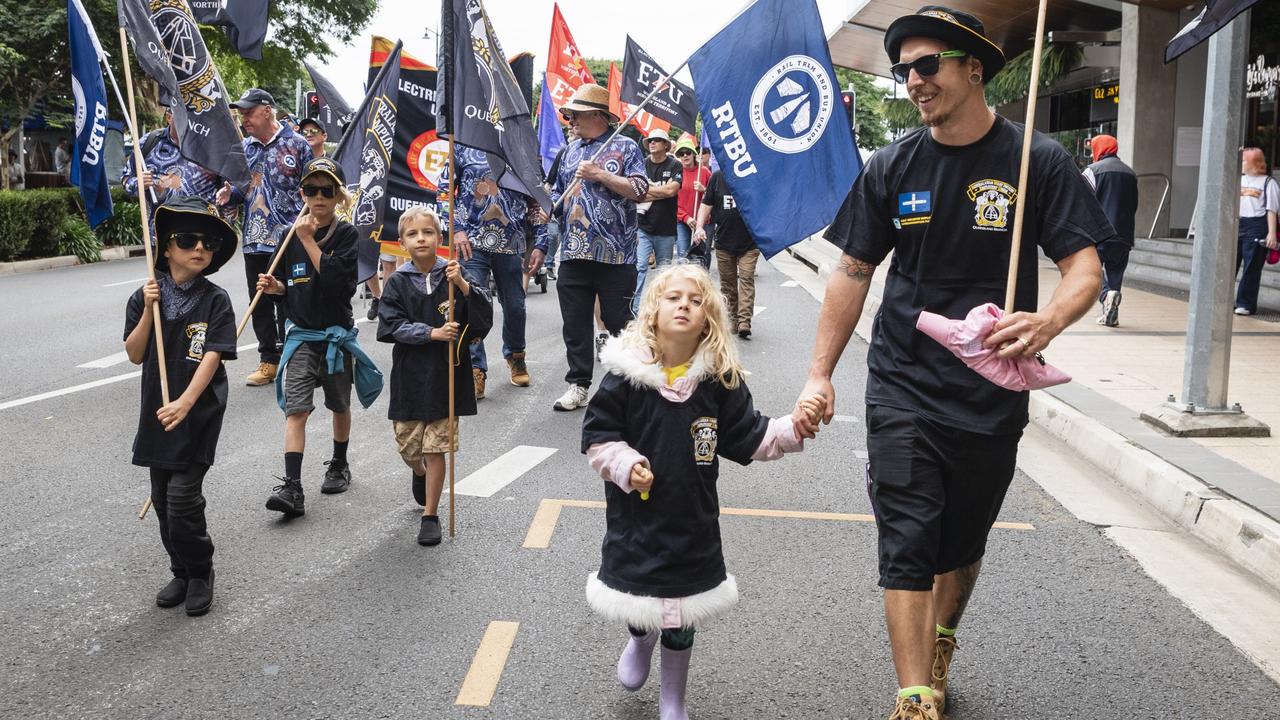 Marching with the AMIEU members are (from left) Isaiah, Kayden, Jonah, Makenna and Daniel Clarke at the Toowoomba Labour Day march, Saturday, April 29, 2023. Picture: Kevin Farmer