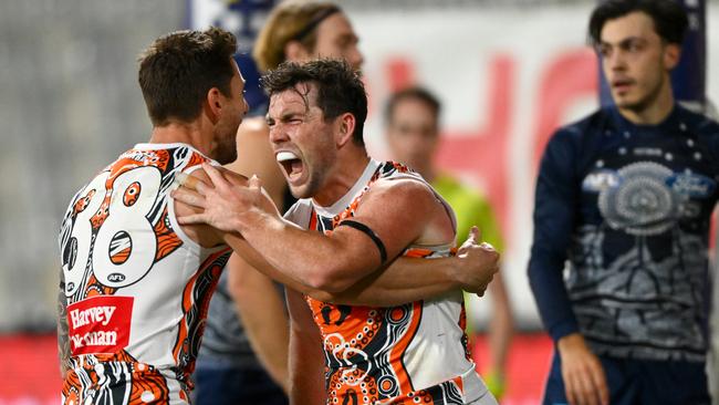 Brent Daniels and Daniel Lloyd celebrate a goal for the Giants against the Cats in round 11. Picture: Morgan Hancock/AFL Photos/via Getty Images