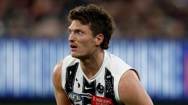 MELBOURNE, AUSTRALIA - JULY 05: Brody Mihocek of the Magpies is seen injured during the 2024 AFL Round 17 match between the Collingwood Magpies and the Essendon Bombers at Melbourne Cricket Ground on July 05, 2024 in Melbourne, Australia. (Photo by Michael Willson/AFL Photos via Getty Images)