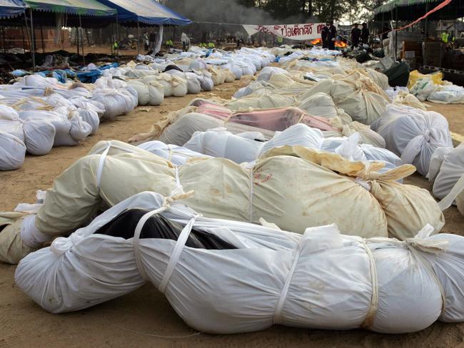 “Too many corpses.” Bodies are sorted for identification at a roadside morgue in Khao Lak.