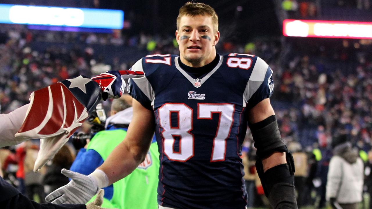 FOXBORO, MA - JANUARY 10: Rob Gronkowski #87 of the New England Patriots walks off the field following the 2015 AFC Divisional Playoffs game against the Baltimore Ravens at Gillette Stadium on January 10, 2015 in Foxboro, Massachusetts. Jim Rogash/Getty Images/AFP == FOR NEWSPAPERS, INTERNET, TELCOS & TELEVISION USE ONLY ==