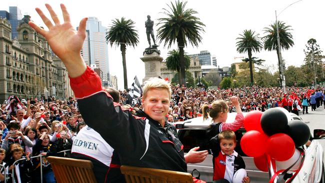 St Kilda captain Nick Riewoldt waves as the St Kilda and Collingwood teams take part in the 2010 AFL Grand Final Parade.