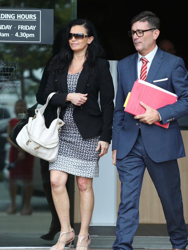 Suzi Taylor and her lawyer Michael Gatenby leave Southport court. Picture Glenn Hampson