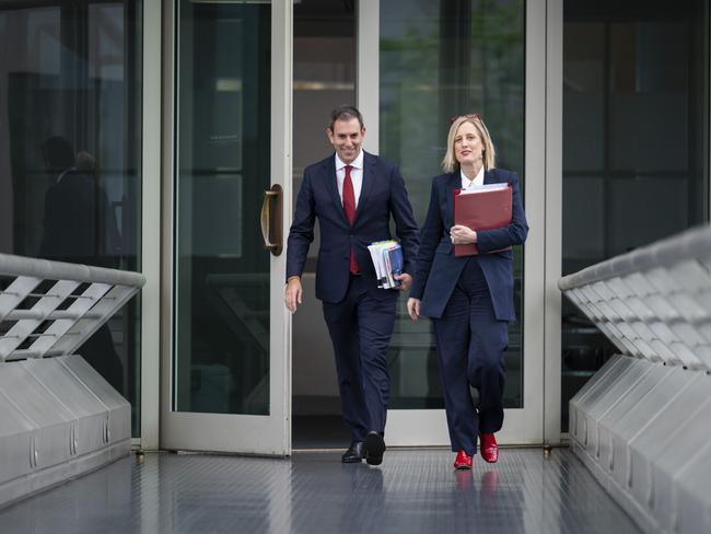 CANBERRA, AUSTRALIA - OCTOBER 25: Treasurer Jim Chalmers and Finance Minister Katy Gallagher arriving at the press gallery at Parliament House on October 25, 2022 in Canberra, Australia. Federal treasurer Jim Chalmers will deliver the Albanese government's first budget later today.  The 2022-23 federal budget will include lower-priced medicines, available from January 1, 2023, $1.4 billion to extend COVID-19 response measures until December 31st, $33.6 million in medical research grants to help reduce the number of those affected by heart disease and stroke. For families and women, paid parental leave allowance will be expanded by six weeks up to 26 weeks, amounting to an extra $6499 and $15.8 million will fund projects to increase women's participation and representation in the workforce and leadership roles.  (Photo by Martin Ollman/Getty Images)