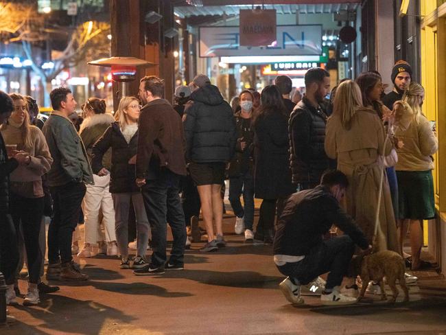 Crowds gather outside Ladyboy bar in Richmond as part of a ‘takeaway’ pub crawl. Picture: Tony Gough