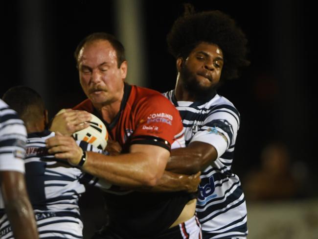 Litchfield’s Aaron Barnes is met by Brothers’ Caleb Niki in the thrilling 2020 NRL NT Grand Final. Picture: KATRINA BRIDGEFORD