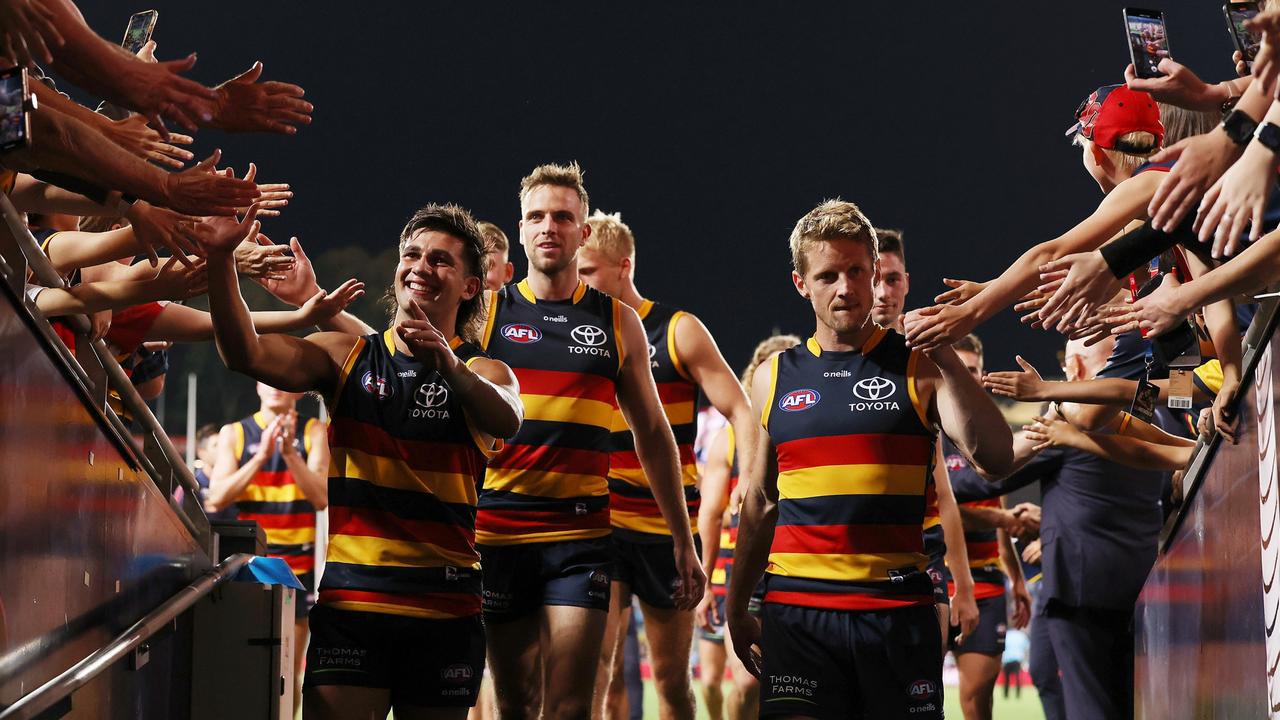 Adelaide players leave the field after their win. Picture: Getty Images