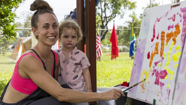 Emma King and Alexandera Mayne as families enjoy a day of fun and activities at a special Harmony Day celebration at the Malak Community Centre as part of the Fun Bus program. Picture: Pema Tamang Pakhrin