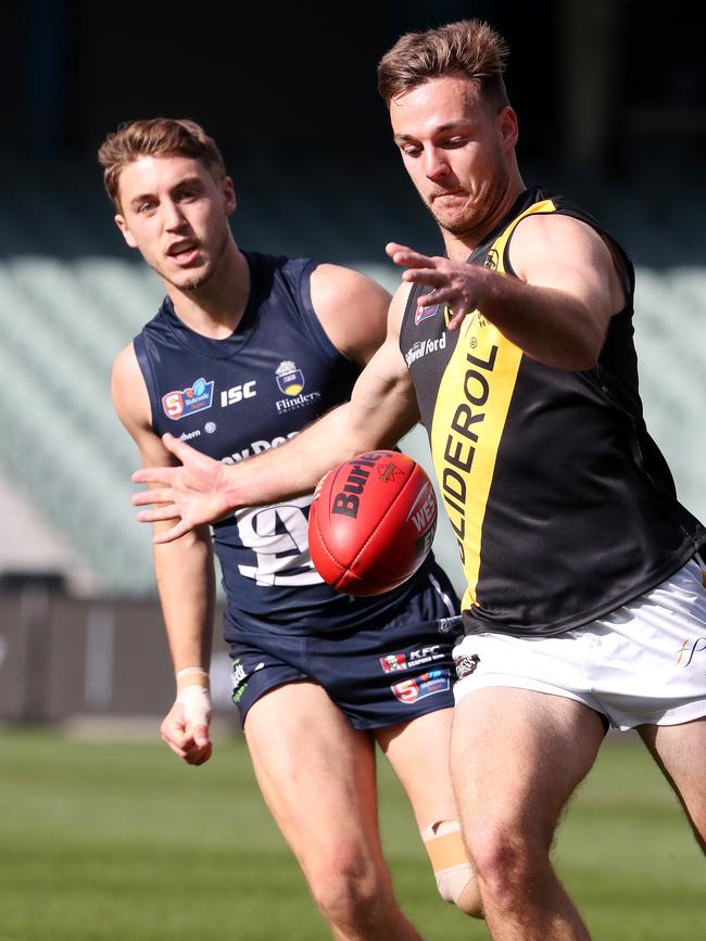 Cory Gregson gets his kick away for Glenelg in the SANFL last season. Picture: Sarah Reed