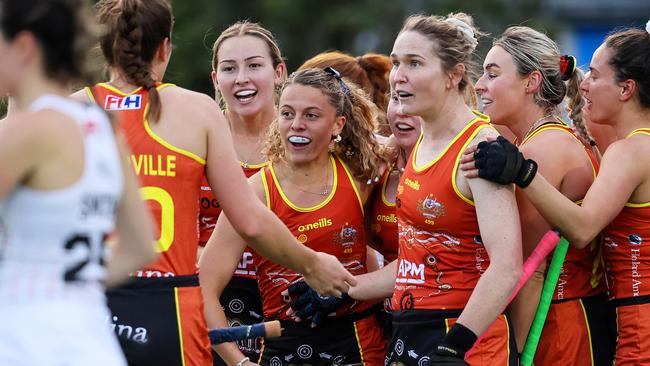 The Hockeyroos swamp Rosie Malone after her equaliser against the Black Sticks. Picture: BW Media