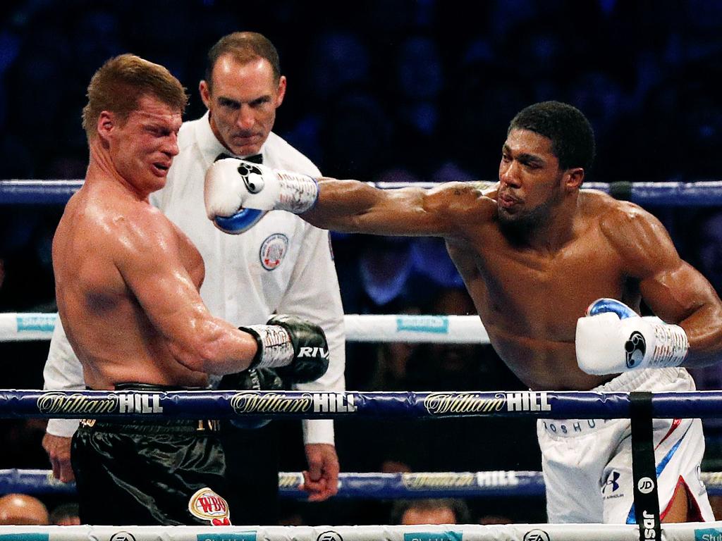 The right hand that changed the fight. (Photo by ADRIAN DENNIS / AFP)