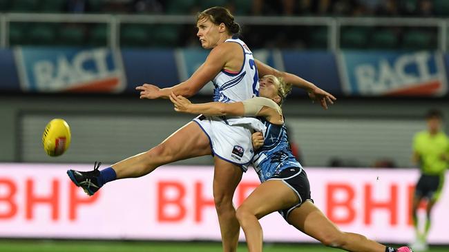 Jasmine Garner kicks downfield during the round five AFLW match between the North Melbourne Kangaroos and the Carlton Blues at UTAS Stadium on February 27. (Photo by Steve Bell/Getty Images)