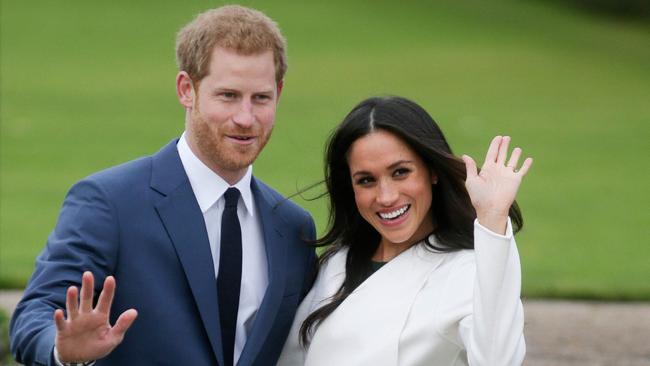 The couple pose for a photo, and are all smiles. Picture: Daniel Leal-Olivas/AFP