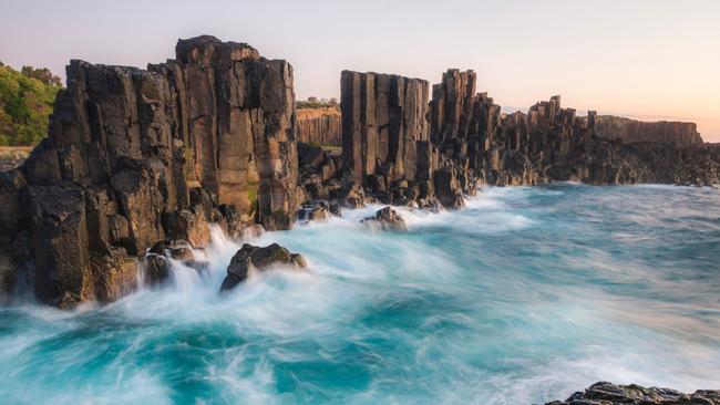 Rock formations at Bombo Headland Quarry are a product of the Kiama’s mining history and blue metal quarrying in the 1880s and 1900s. Picture: Visit NSW