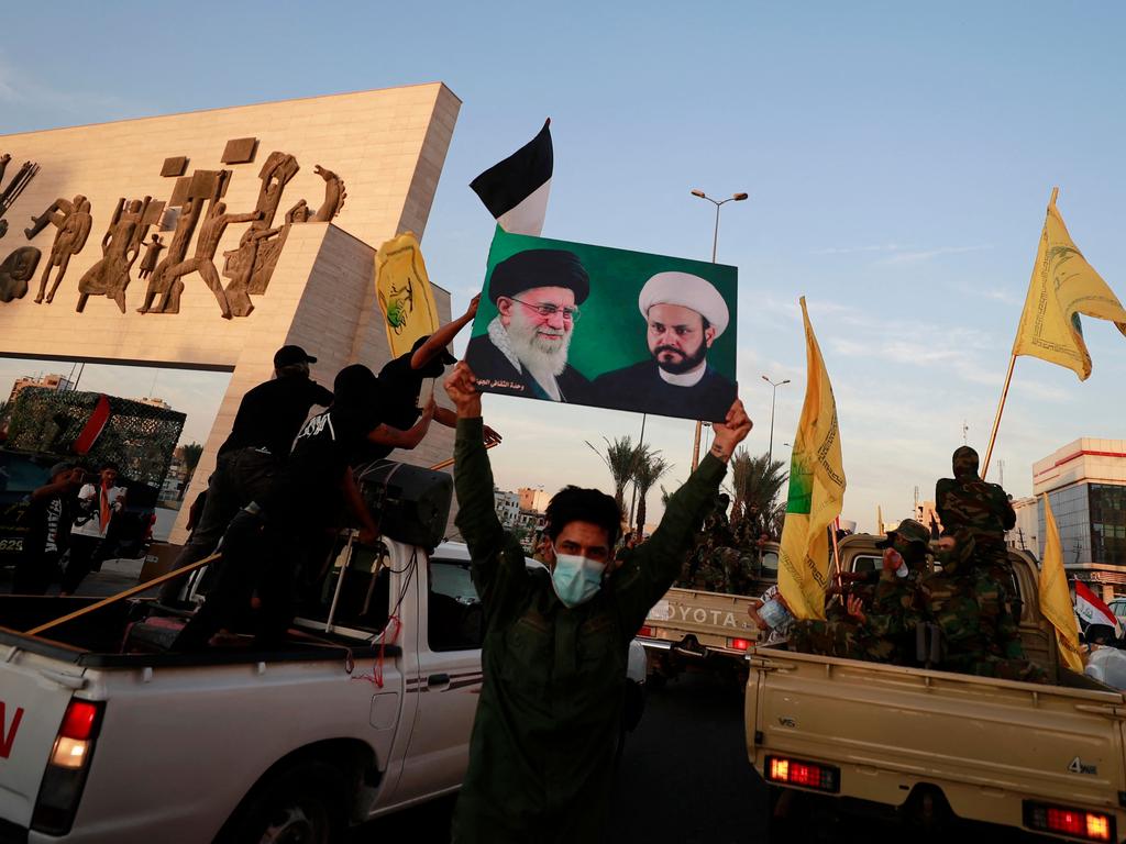 Members of Iraq's Shiite Muslim al-Nujaba movement attend a rally in Baghdad. Picture: AFP