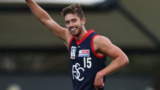 Kyle Dunkley celebrates a goal during Casey Demons’ win over Collingwood. Picture: Photo by Scott Barbour/AFL Photos/Getty Images.