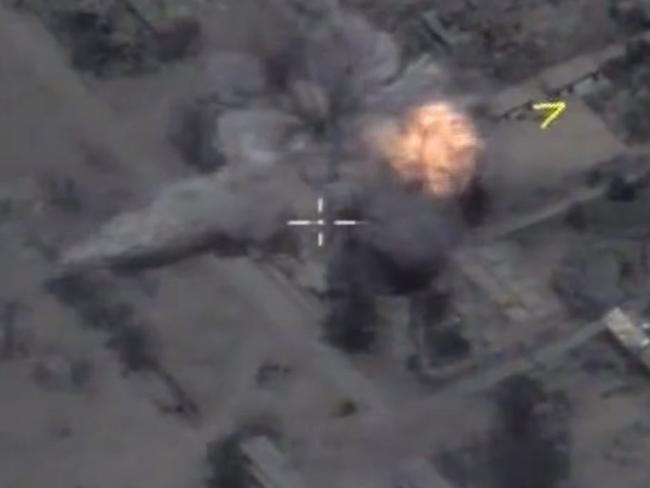 A screen capture of Russian Ministry of Defence footage purporting to show cruise missiles from the submarine Krasnodar striking targets near Palmyra, Syria, earlier this year.